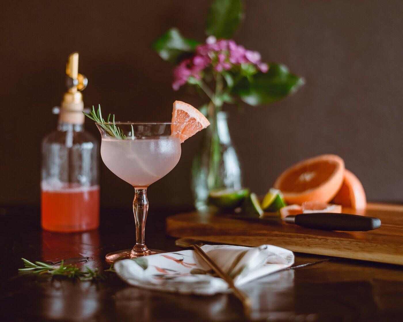 cocktail with grapefruit and rosemary - cookbook gift buying guide